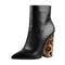 Bottines léopard noires chics.