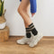 chaussettes léopard noires hautes.