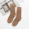 chaussettes beiges léopard.
