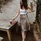 Jupe midi léopard beige.