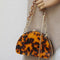 Pochette femme léopard.