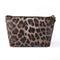 Pochette de maquillage léopard.
