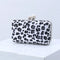 Pochette blanche léopard minaudière.