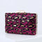 Pochette léopard minaudière carrée.