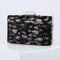 Pochette léopard minaudière noire.