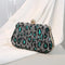 Pochette léopard turquoise.