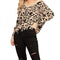 Pull léopard beige effet déchiré.