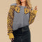 Pull gris léopard femme.