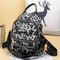 Sac imprimé léopard gris.