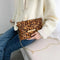 Sac enveloppe léopard.