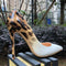 talons léopard vernis blanc.