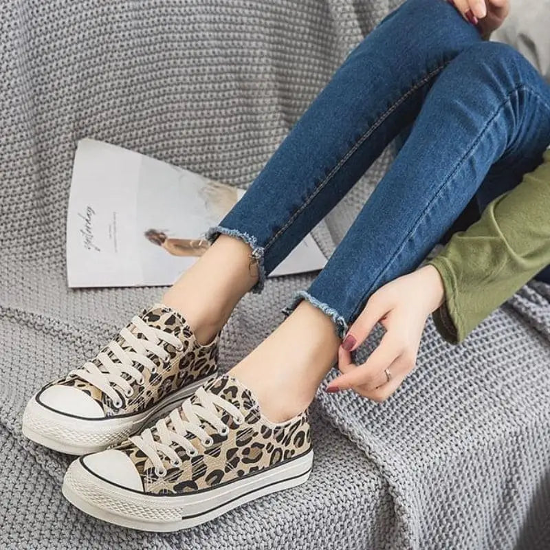 Converse online leopard basse