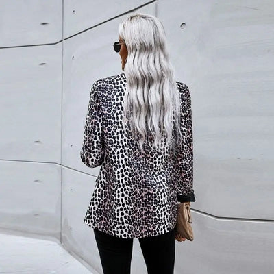 Dos blazer femme imprimé léopard.