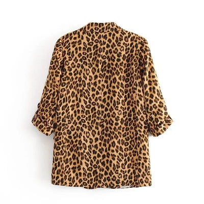 Dos blazer motif léopard.