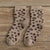 chaussettes léopard beiges.