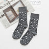 chaussettes motif léopard grises.
