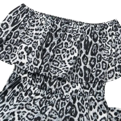combinaison léopard grise épaules dénudées.