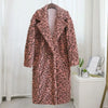 Manteau rose léopard fausse fourrure.