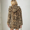 Manteau mi long fausse fourrure léopard.