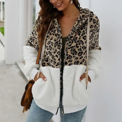 Manteau léopard bicolore blanc.