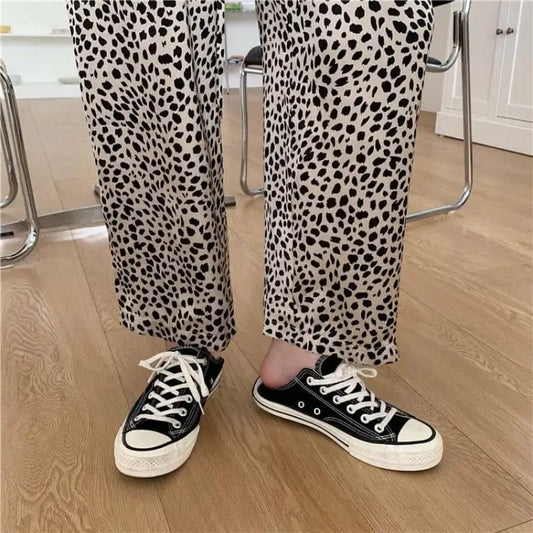 Pantalon large taille haute imprimé léopard contenant du coton Pantalon large taille haute imprimé léopard contenant du coton