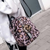 Petit sac à dos léopard rose.