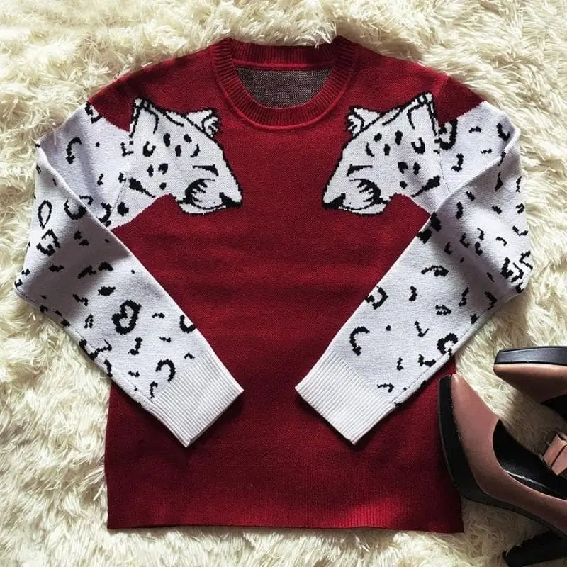 Pull léopard bordeaux.