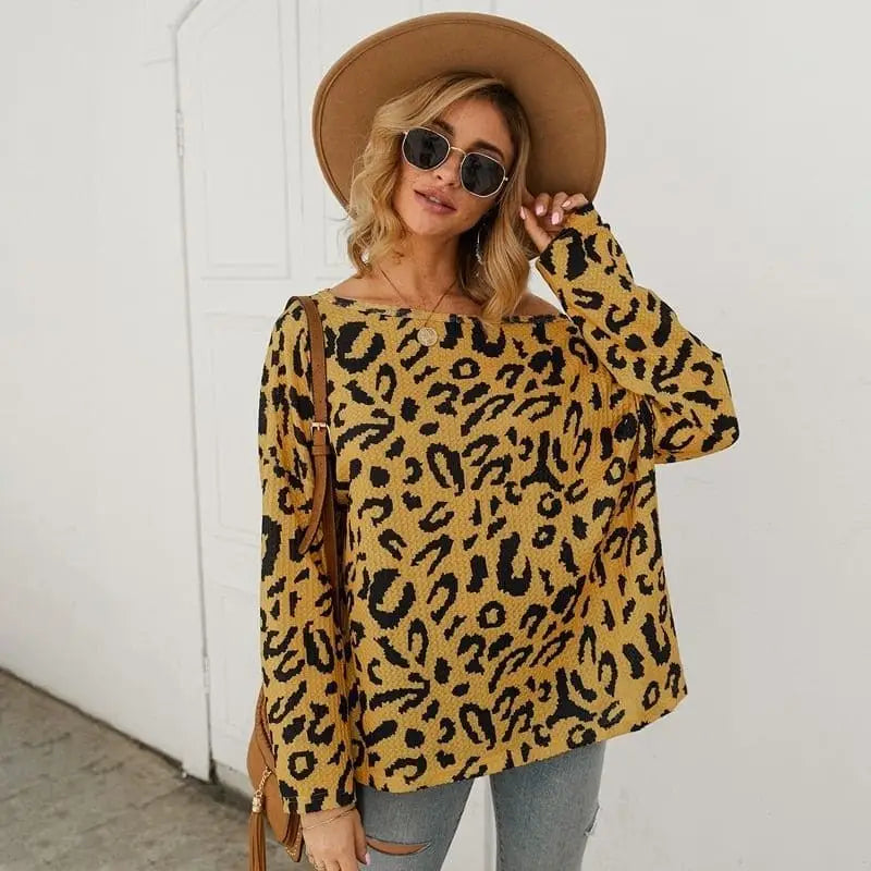 Pull col bardot moutarde léopard.