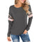 Pull léopard gris.