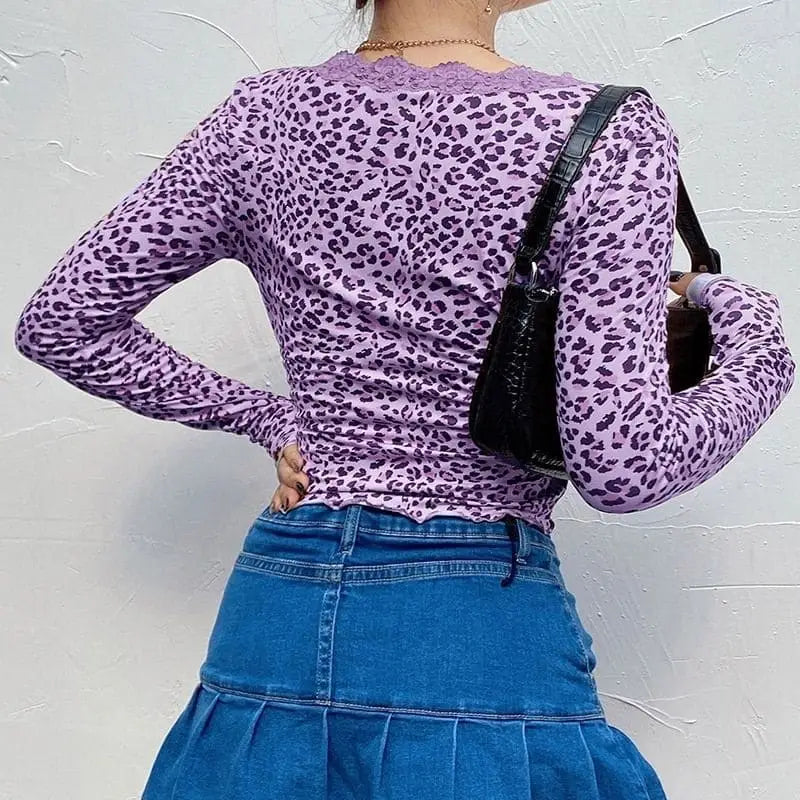 Pull dentelle violet léopard.