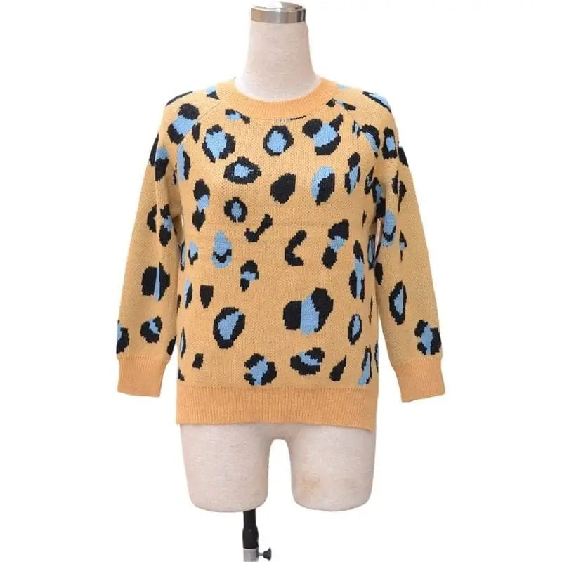 Pull bleu et jaune léopard.