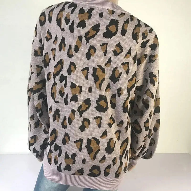 Dos pull léopard femme.