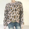 Pull femme léopard.