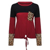 Pull rouge et noir léopard.