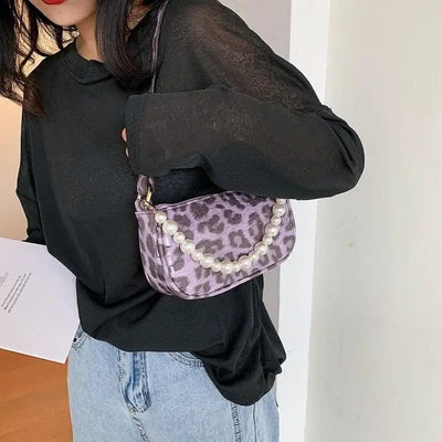 Petit sac léopard épaule violet.
