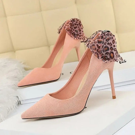 talons léopard colorés rose.