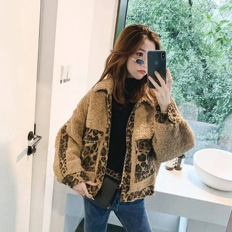 Veste fausse fourrure léopard.